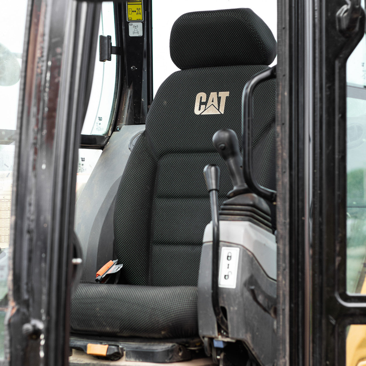 CAT excavator seat without cover